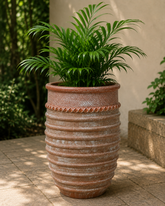 Egg shaped ribbed pot